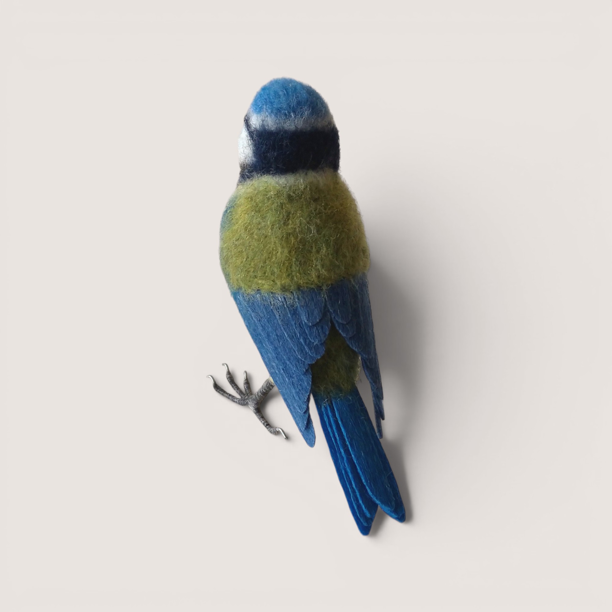 Blue Tit 3 Back view of a handmade needle felted Blue Tit showing the wing and tail.