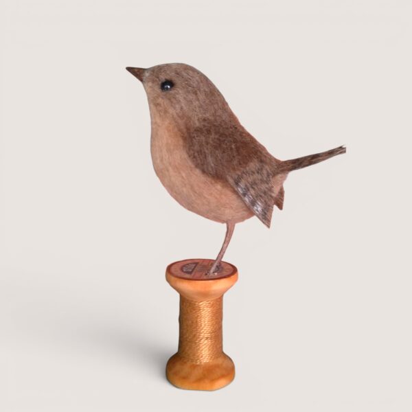 Wooden Bobbin Bird Collection 12 Side view of a needle felted wren on a wooden bobbin