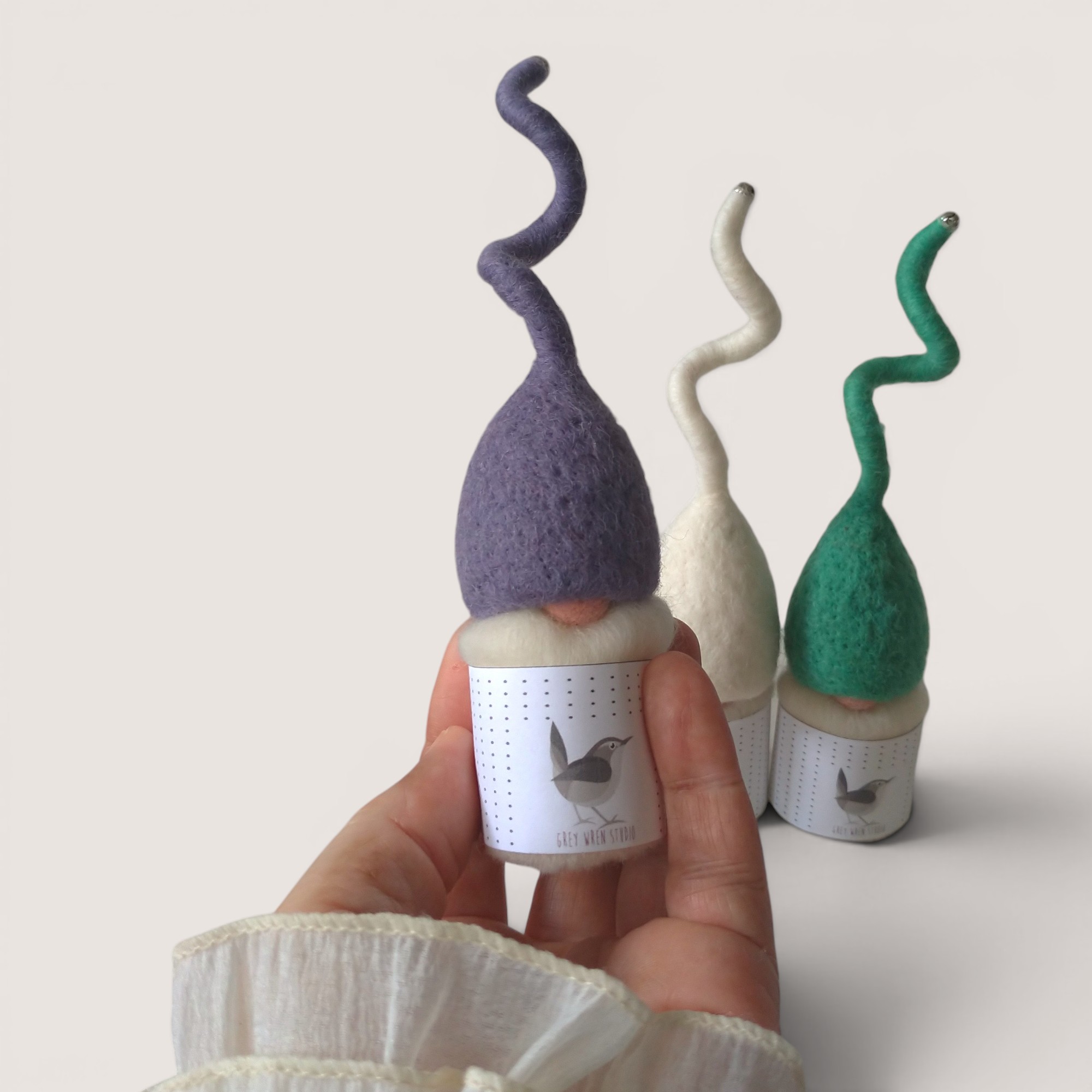 Tomten – Set of Three (Sea Glass) 4 Needle felted Tomten by Grey Wren Studio held in hand to show scale
