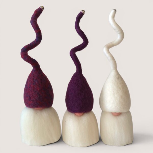 Needle felted Tomten set of three by Grey Wren Studio in the Bilberry Hollow colour palette shown from the front.