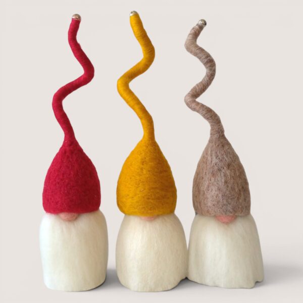 Needle felted Tomten set of three by Grey Wren Studio in the Winter Hearth colour palette shown from the front.